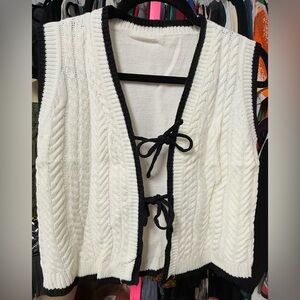 Women’s size XS sweater vest white black trim cable knit open tie strappy front